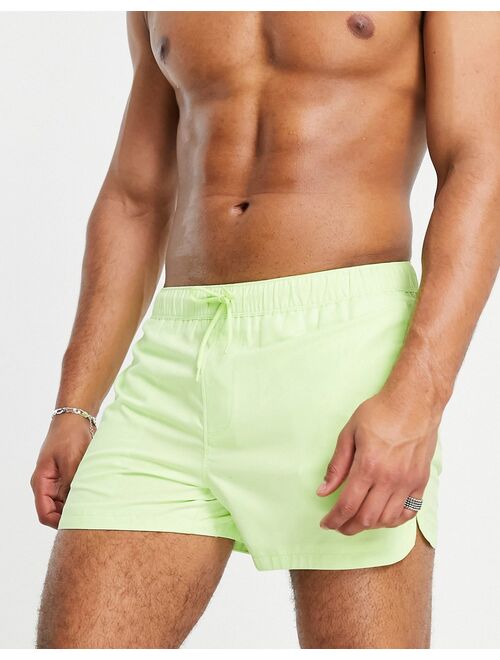 ASOS DESIGN swim shorts with pin tuck in light green short length