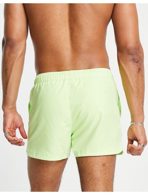 ASOS DESIGN swim shorts with pin tuck in light green short length