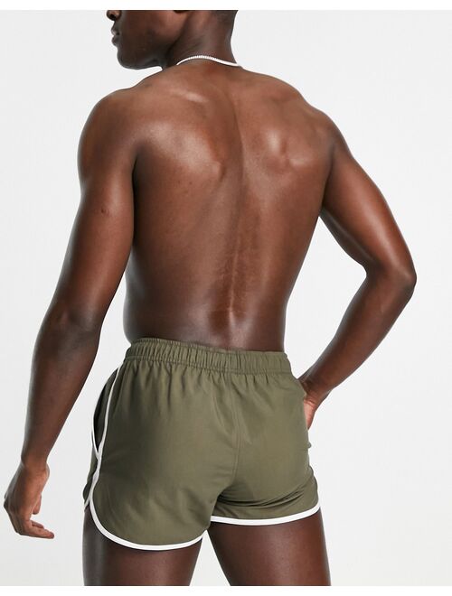 ASOS DESIGN runner swim shorts in khaki with white binding