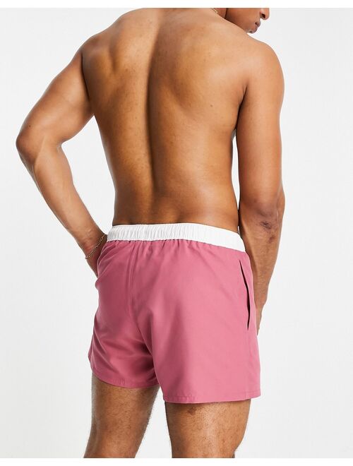 ASOS DESIGN swim shorts in pink with white tipping short length