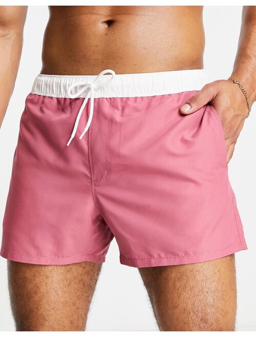 ASOS DESIGN swim shorts in pink with white tipping short length