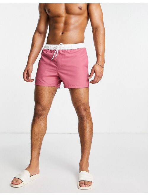 ASOS DESIGN swim shorts in pink with white tipping short length