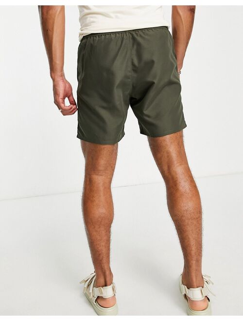 ASOS DESIGN swim shorts in khaki mid length