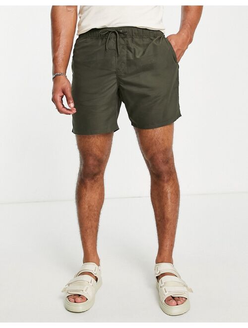 ASOS DESIGN swim shorts in khaki mid length