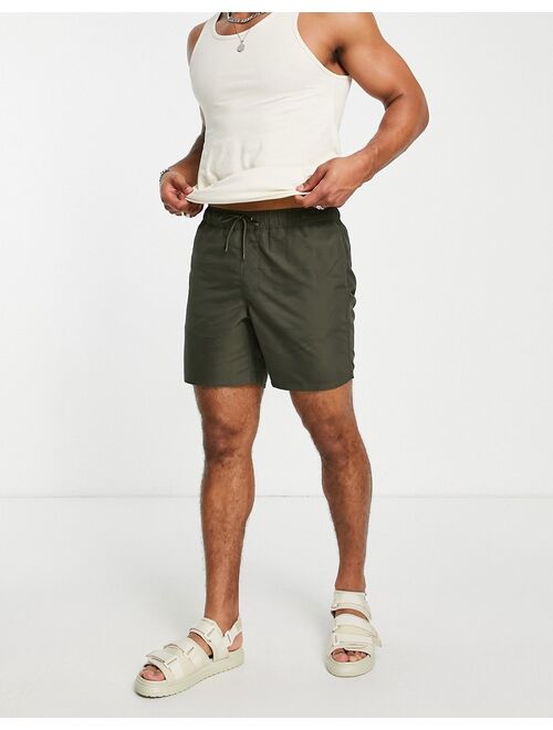 ASOS DESIGN swim shorts in khaki mid length