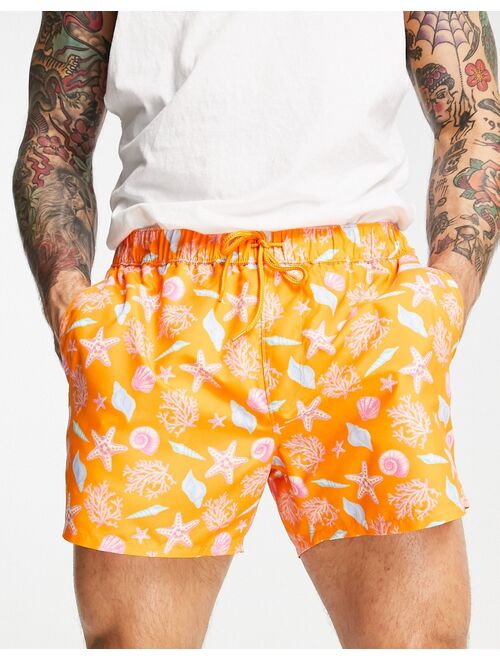 ASOS DESIGN sea shell print swim shorts in orange