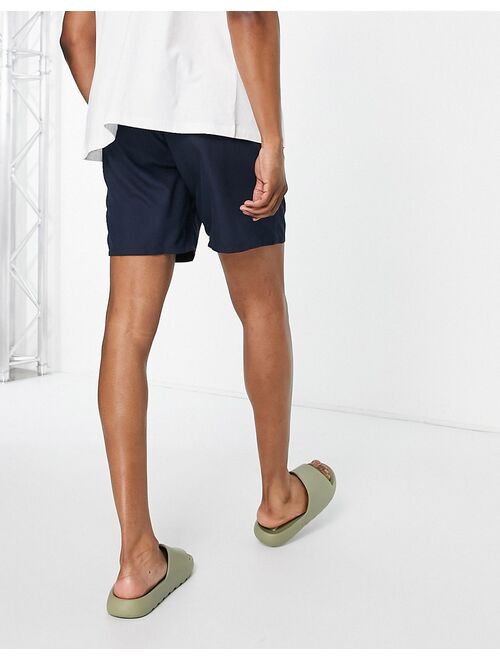 ASOS DESIGN swim shorts in navy mid length