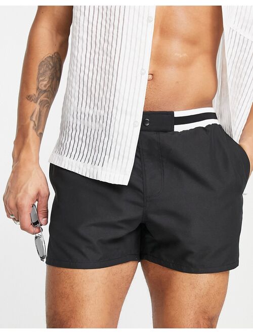 ASOS DESIGN swim shorts with contrast waistband in black short length