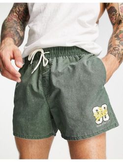 swim shorts with acid wash and collegiate print in short length