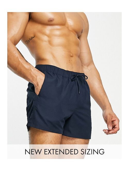 ASOS DESIGN swim shorts in navy short length