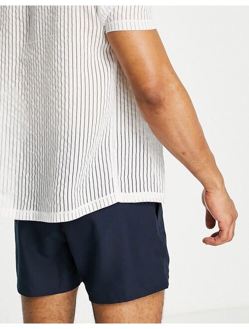 ASOS DESIGN swim shorts in navy short length