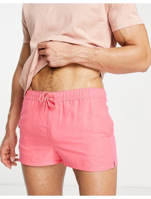 ASOS DESIGN swim shorts in coral super short length