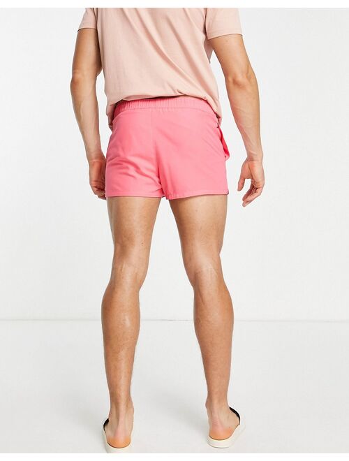 ASOS DESIGN swim shorts in coral super short length