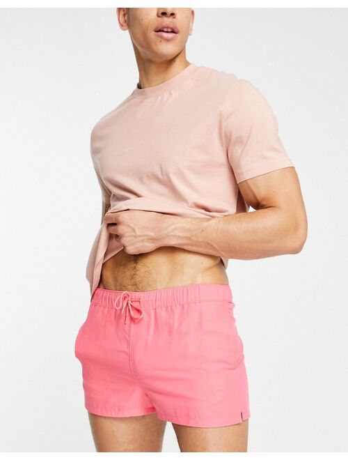 ASOS DESIGN swim shorts in coral super short length