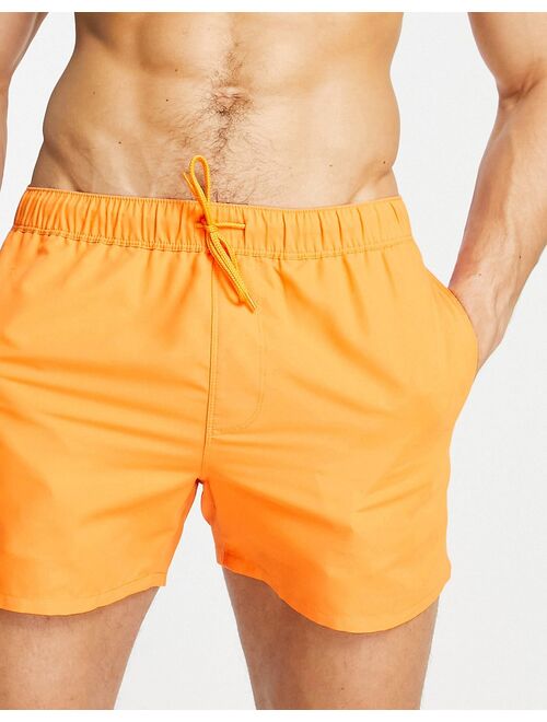 ASOS DESIGN swim shorts in bright orange short length