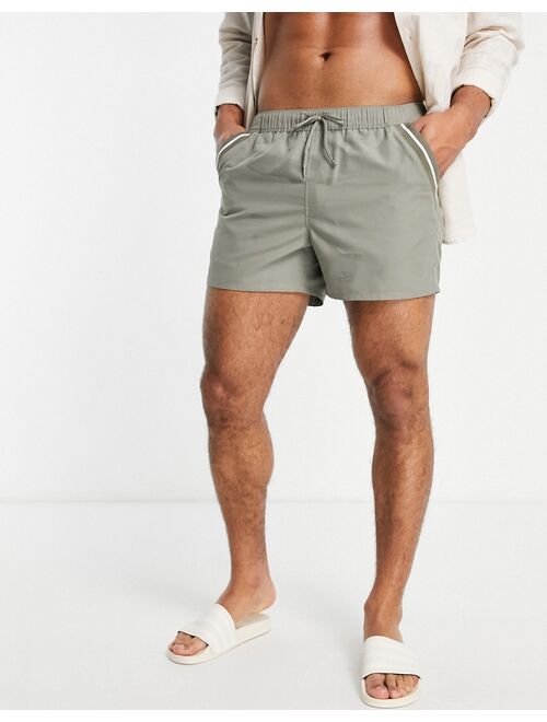 ASOS DESIGN swim shorts in khaki with tipping