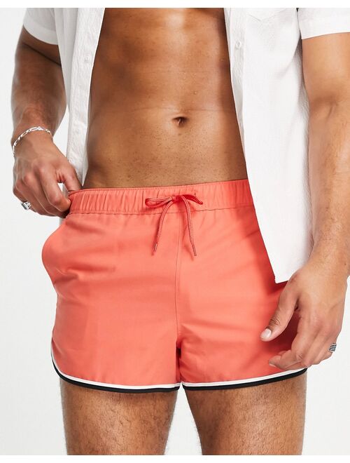 ASOS DESIGN runner swim shorts in red with contrast binding