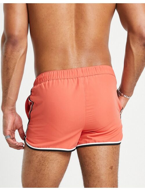 ASOS DESIGN runner swim shorts in red with contrast binding