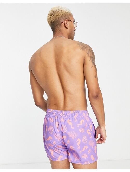 ASOS DESIGN swim shorts with sea horse print short length