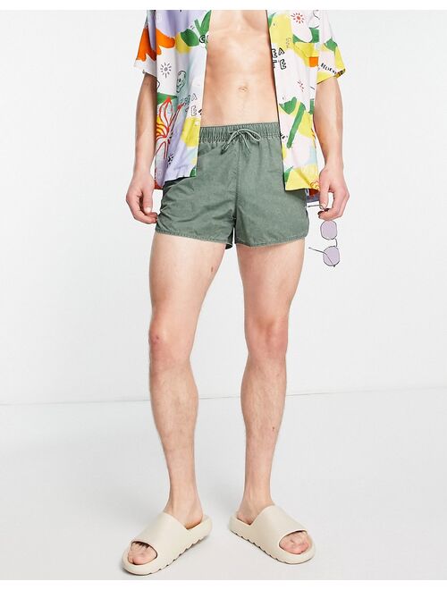 ASOS DESIGN runner swim shorts in green acid wash