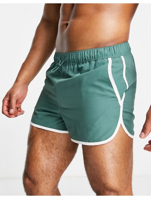 ASOS DESIGN runner swim shorts with toggle and contrast binding in green