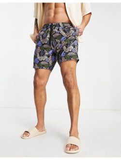 swim shorts with leaf print mid length