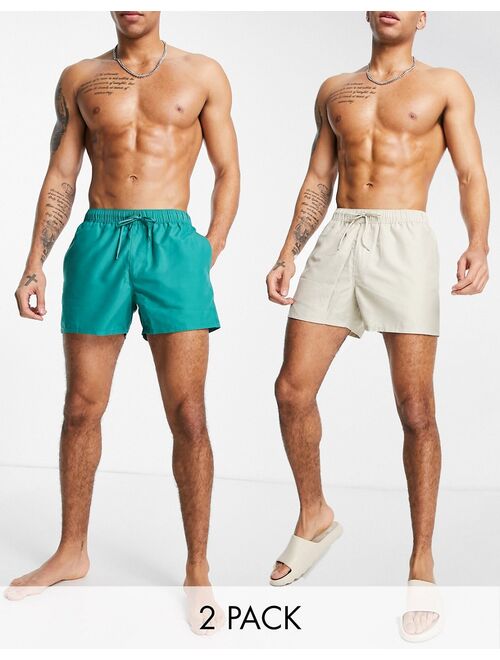 ASOS DESIGN swim shorts in beige and green short length save