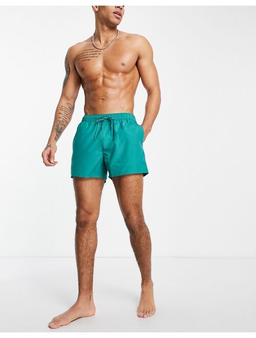 ASOS DESIGN swim shorts in beige and green short length save