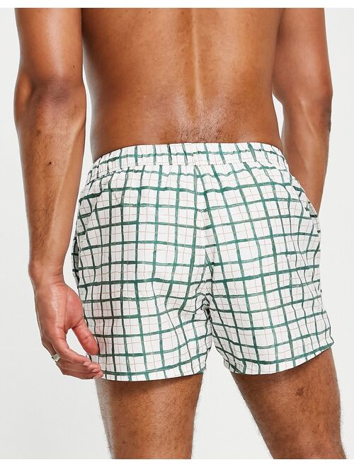 ASOS DESIGN swim shorts with hand drawn check print short length