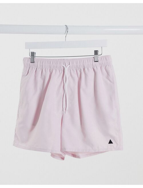 ASOS DESIGN swim shorts in pink with triangle embroidery short length