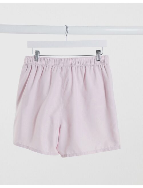 ASOS DESIGN swim shorts in pink with triangle embroidery short length