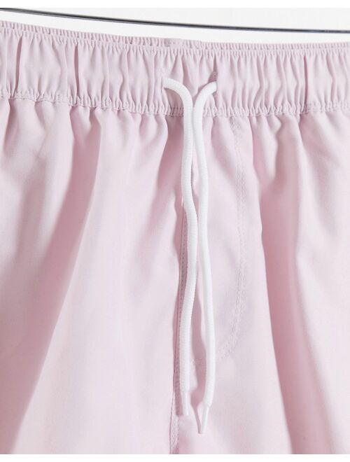 ASOS DESIGN swim shorts in pink with triangle embroidery short length