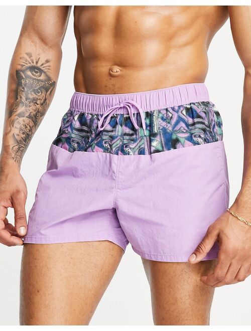 ASOS DESIGN swim shorts in purple acid wash with pattern