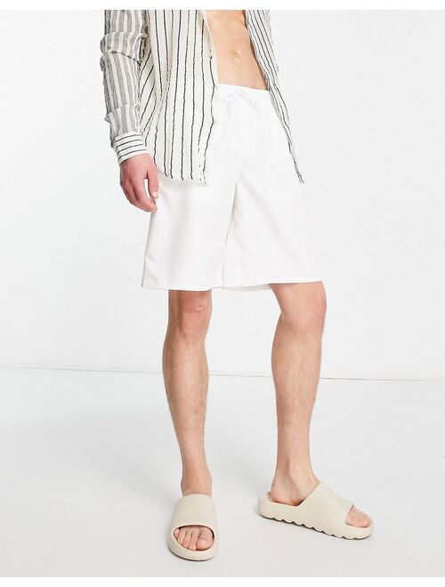 ASOS DESIGN swim shorts in white long length