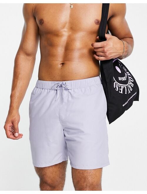 ASOS DESIGN swim shorts in light blue with eyelets in mid length