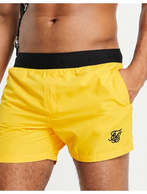 SikSilk standard swim shorts in yellow