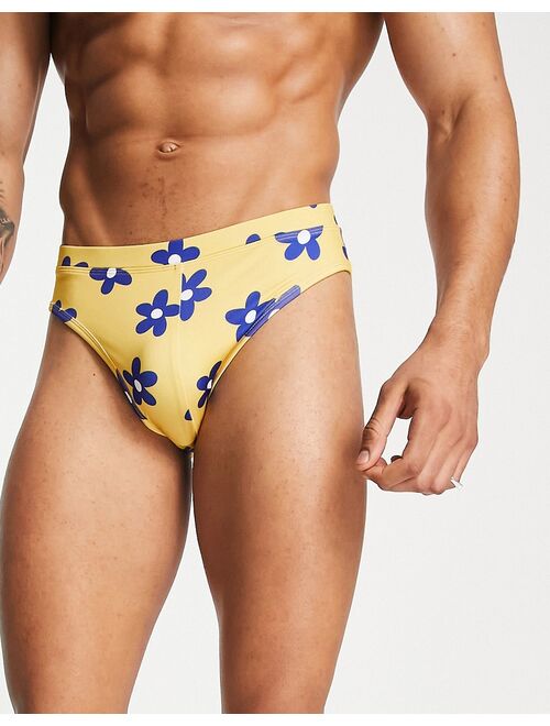 ASOS DESIGN swim briefs in yellow floral print