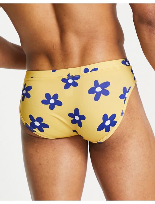 ASOS DESIGN swim briefs in yellow floral print