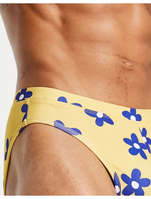 ASOS DESIGN swim briefs in yellow floral print