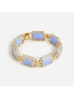 Encased-marble station bracelet