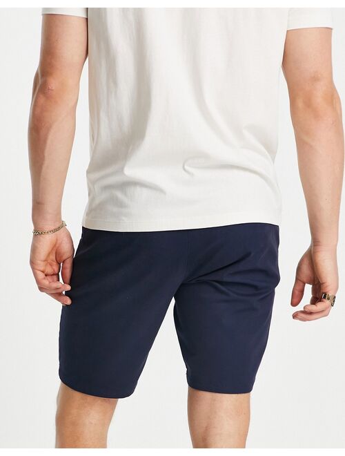 ASOS DESIGN skinny chino shorts in navy