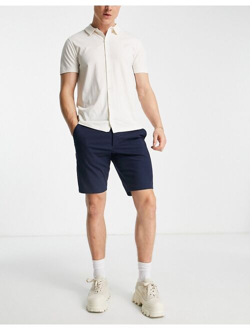 ASOS DESIGN skinny chino shorts in navy