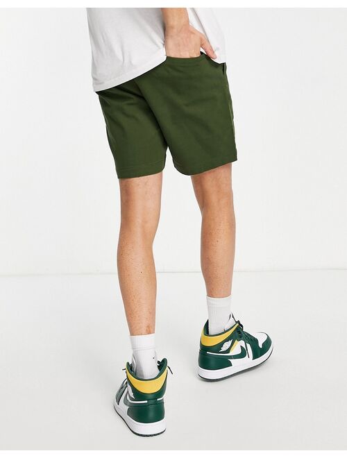 ASOS DESIGN slim chino shorts in green