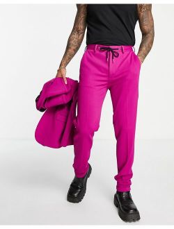 super skinny suit pants with sweatpants waist in pink crepe