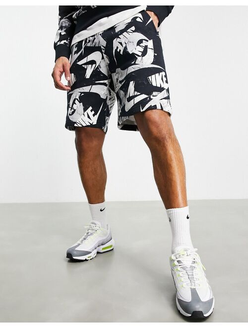 Nike Club Fleece all over logo print shorts in black