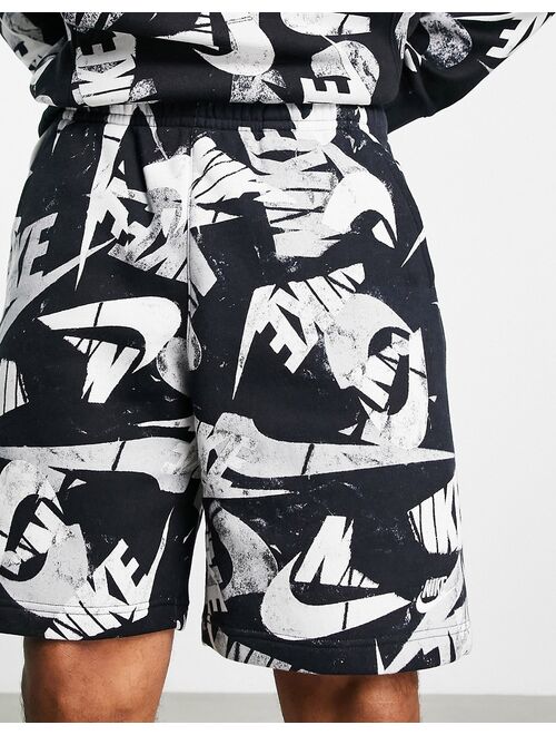 Nike Club Fleece all over logo print shorts in black