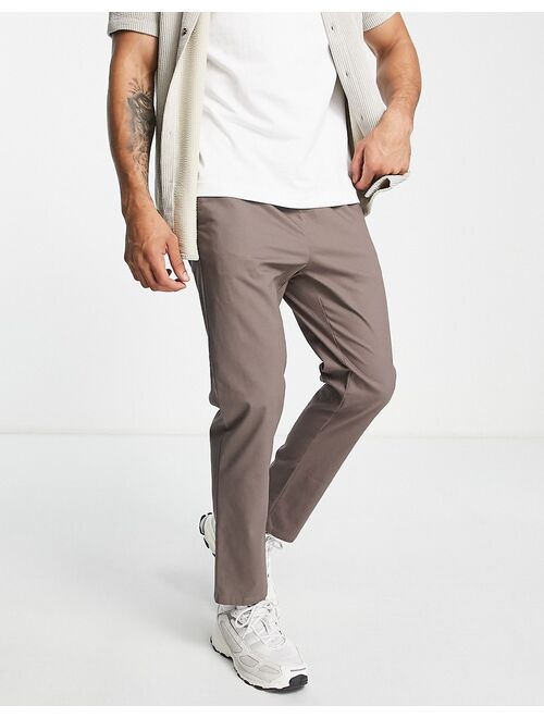 ASOS DESIGN slim chinos with elasticized waist in brown