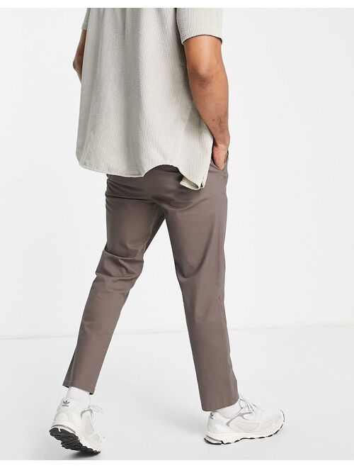 ASOS DESIGN slim chinos with elasticized waist in brown