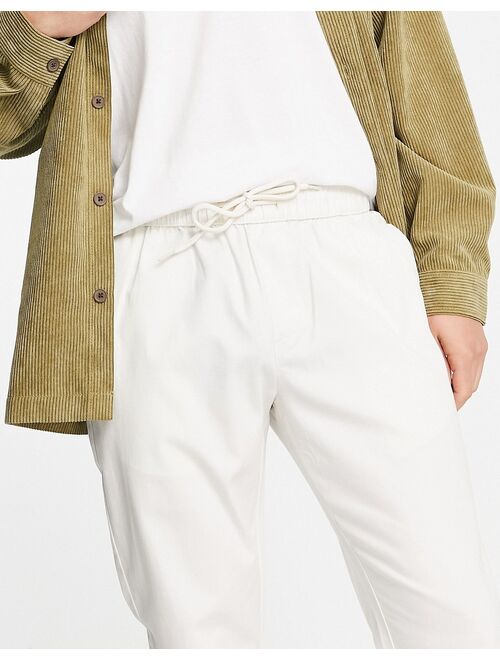 ASOS DESIGN slim chinos with elasticated waist in cream