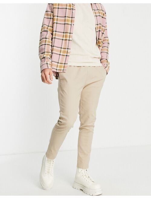 ASOS DESIGN skinny chinos with elasticated waist in beige